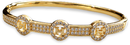 Brazalete Dorado de Microcirconia con Motivos Enmarcados